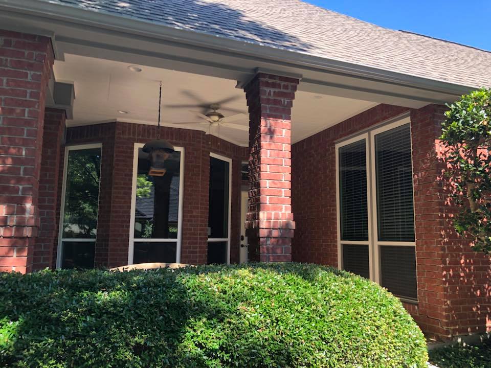 brick house with energy star replacement windows